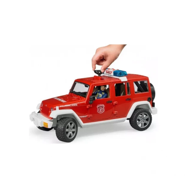 BRUDER Машинка іграшкова - пожежний джип Ренглер Рубікон + фігурка пожежника - 7